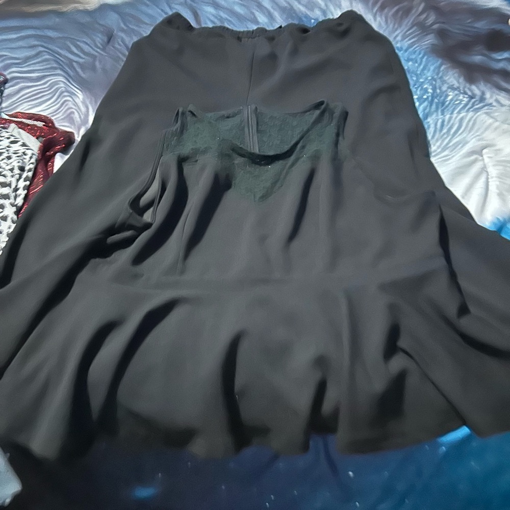 Elegant Black Top with Peplum Detail